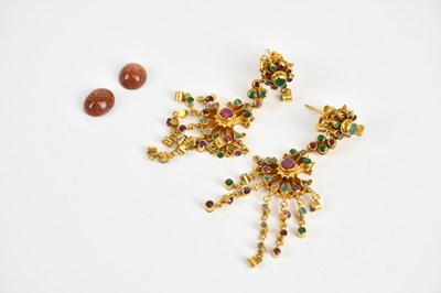 Lot 1620 - A pair of Eastern yellow metal drop earrings,...