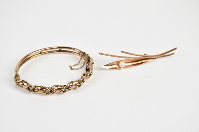 Lot 1608 - A 9ct yellow gold pearl set brooch, approx...