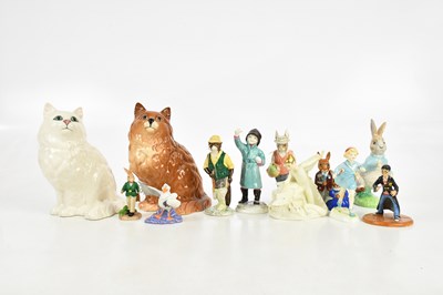 Lot 154 - BESWICK; two models of cats, numbered 1361867,...