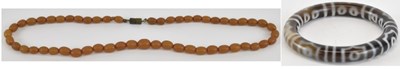 Lot 1345 - A small amber bead effect necklace, length...