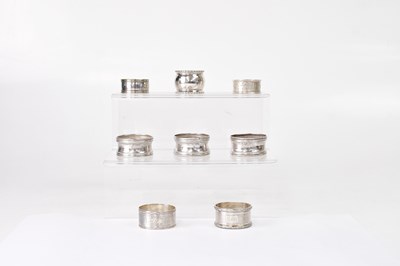 Lot 920 - A collection of seven hallmarked silver napkin...
