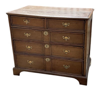 Lot 34 - A 19th century oak chest of two short over...