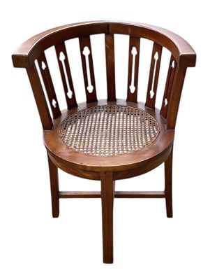 Lot 82 - A reproduction Arts and Crafts style walnut...