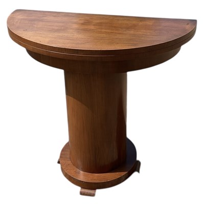 Lot 62 - A 1930s Art Deco walnut veneered demi-lune...