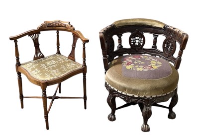 Lot 56 - A late Victorian heavily carved oak six legged...