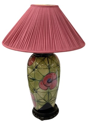 Lot 471 - SALLY TUFFIN FOR MOORCROFT; a table lamp,...