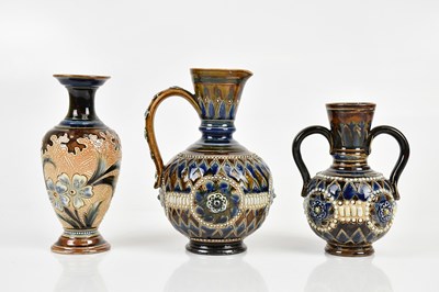 Lot 297 - DOULTON LAMBETH; a twin handled vase, with...