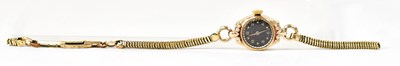 Lot 1170 - ROTARY; a 9ct gold cased ladies' wristwatch on...