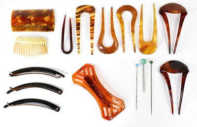 Lot 656 - A collection of faux tortoiseshell hair slides...