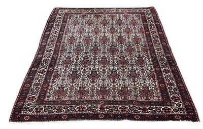 Lot 87 - A modern Persian style hand woven floral...