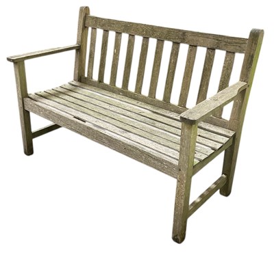 Lot 109 - BARLOW TYRIE LTD; a modern teak garden bench,...