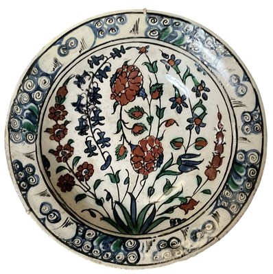 Lot 1000 - A 17th century Turkish Ottoman Iznik plate,...