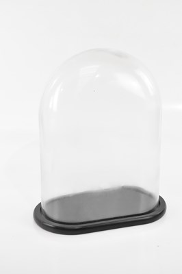 Lot 2380 - A late 19th/early century glass dome and stand,...