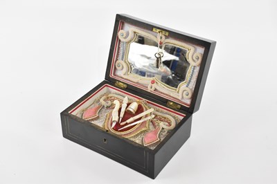 Lot 1369 - Possibly a Palais Royale ebonised and brass...