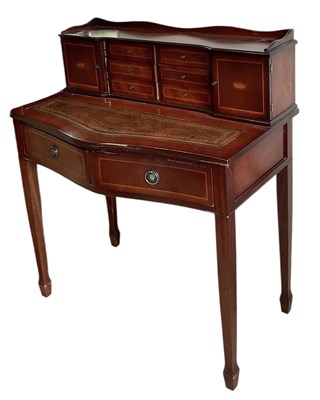 Lot 37 - A reproduction mahogany crossbanded and shell...