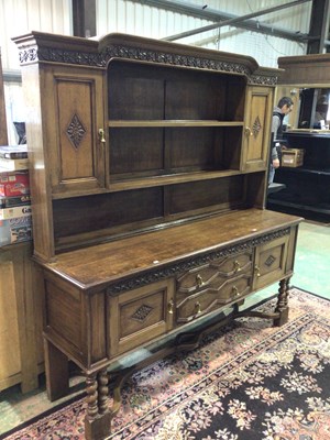 Lot 796 - A 1930s oak dresser with carved detail, 180 x...