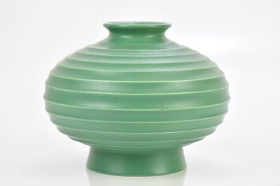 Lot 369 - KEITH MURRAY FOR WEDGWOOD; a green glazed...