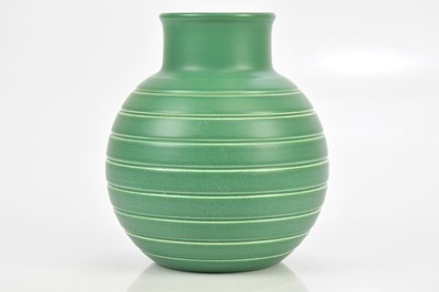 Lot 388 - KEITH MURRAY FOR WEDGWOOD; a green glazed...
