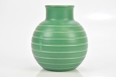 Lot 388 - KEITH MURRAY FOR WEDGWOOD; a green glazed...