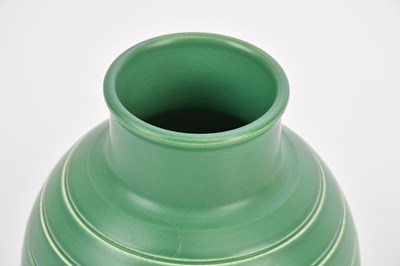 Lot 388 - KEITH MURRAY FOR WEDGWOOD; a green glazed...