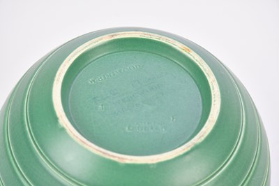 Lot 388 - KEITH MURRAY FOR WEDGWOOD; a green glazed...