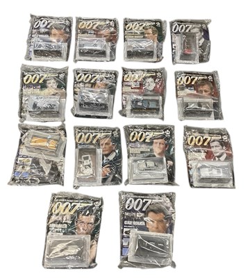 Lot 461 - A collection of fourteen James Bond 007 models,...