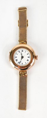 Lot 1176 - A circa 1920s ladies' 9ct gold wristwatch, the...