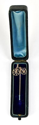 Lot 1065 - A yellow metal pin brooch in the form of a...