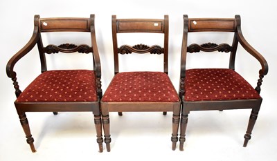 Lot 20 - A set of twelve Regency bar-back dining chairs...