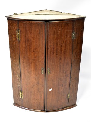 Lot 94 - A 19th century mahogany bow-fronted corner...