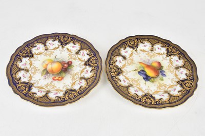Lot 1672 - ROYAL WORCESTER; two hand painted cabinet...