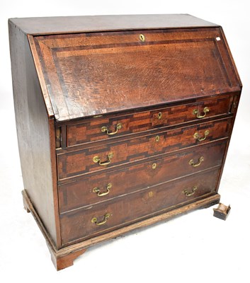 Lot 109 - A George III oak and mahogany crossbanded...
