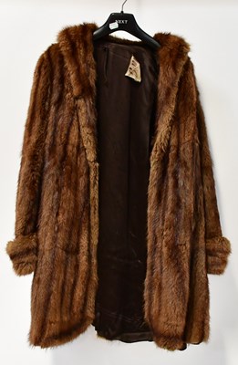 Lot 707 - A fur coat bearing label for 'Bon Marché, the...