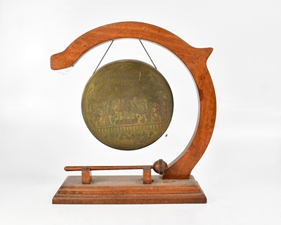 Lot 643 - An oak framed dinner gong, with brass disc...