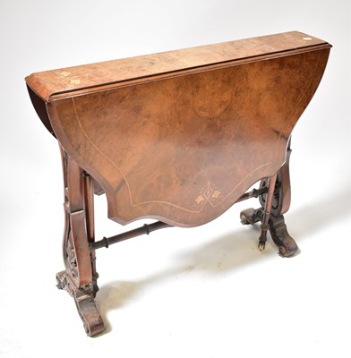 Lot 27 - A Victorian inlaid walnut Sutherland table...
