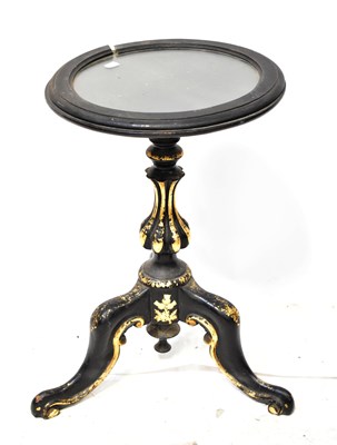 Lot 35 - A Victorian papier-mâché table, with glass...