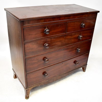 Lot 100 - A George III mahogany chest of two short over...