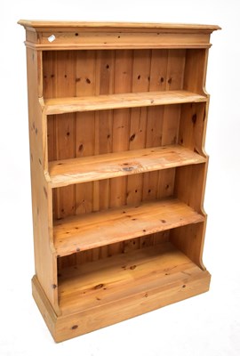 Lot 103 - A modern pine waterfall bookcase of four...