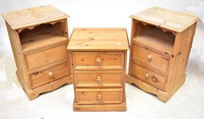 Lot 96 - A pair of pine bedside tables, with open shelf...