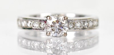 Lot 1013 - An 18ct white gold ring with claw set with a...