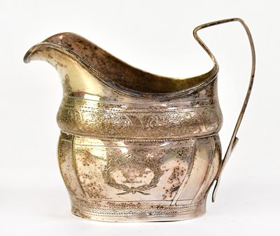 Lot 915 - An Irish hallmarked silver cream or milk jug...