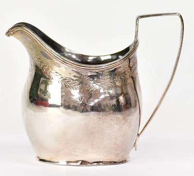 Lot 811 - A George III hallmarked silver cream jug of...