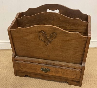Lot 762 - ALBERT OAKROYD; an oak magazine rack with...