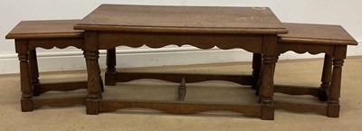 Lot 793 - A nest of three oak occasional tables, width...