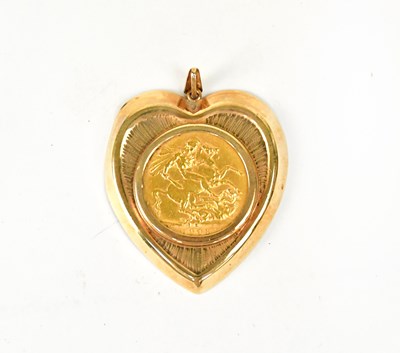 Lot 1074 - An Edward VII full sovereign, 1903, in a 9ct...