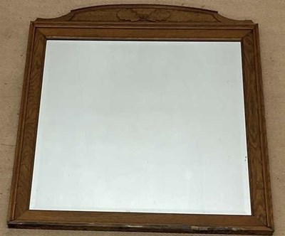Lot 740 - ALBERT OAKROYD; an oak mirror, with bevelled...