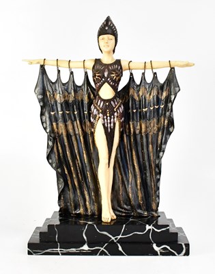 Lot 558 - VERONESE; an Art Deco style resin figure of a...