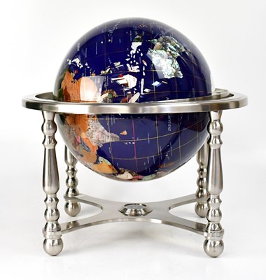 Lot 633 - A globe set with various semiprecious stones,...