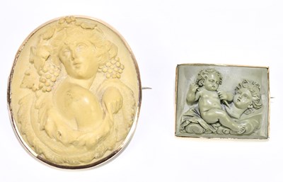 Lot 1457 - Two Victorian yellow metal framed lava cameo...