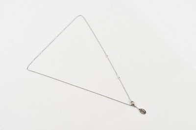 Lot 2107 - CARTIER; an 18ct white gold link chain...
